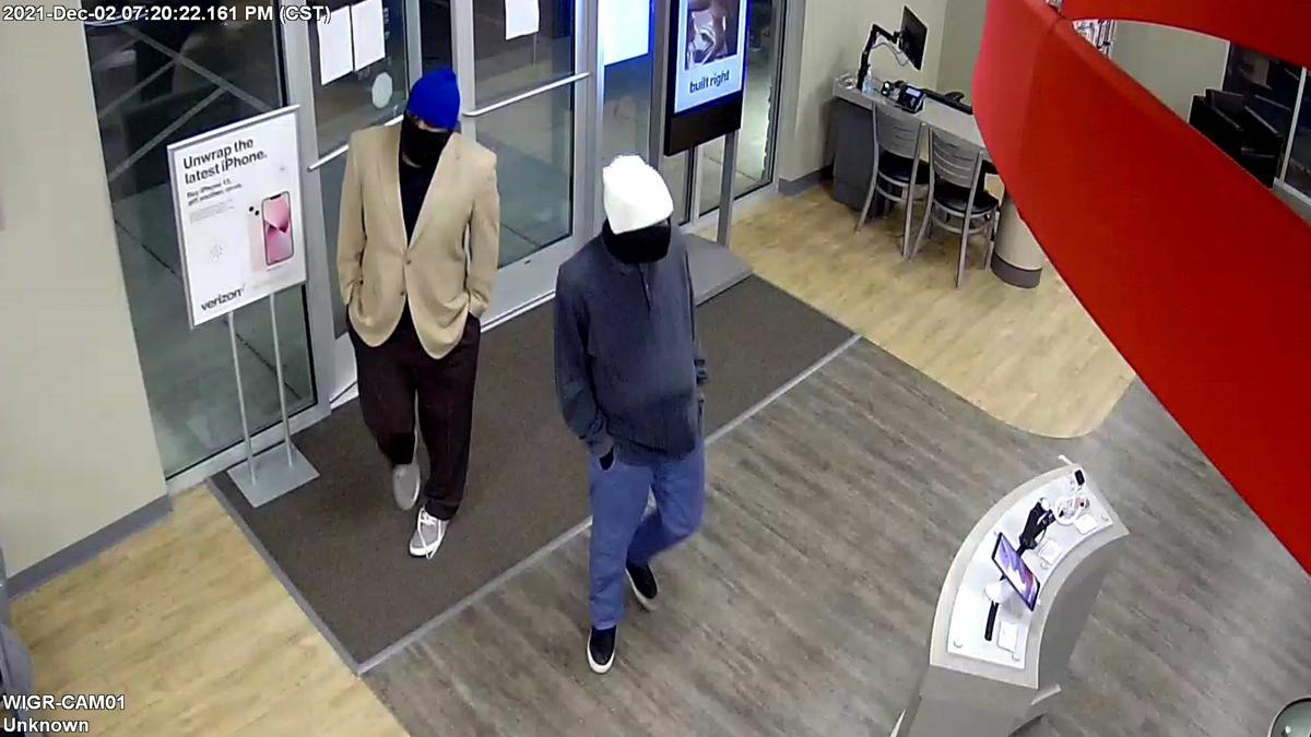 Verizon Wireless robbery suspects, police photo