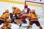 Minnesota hands top-ranked Wisconsin another loss with late goal