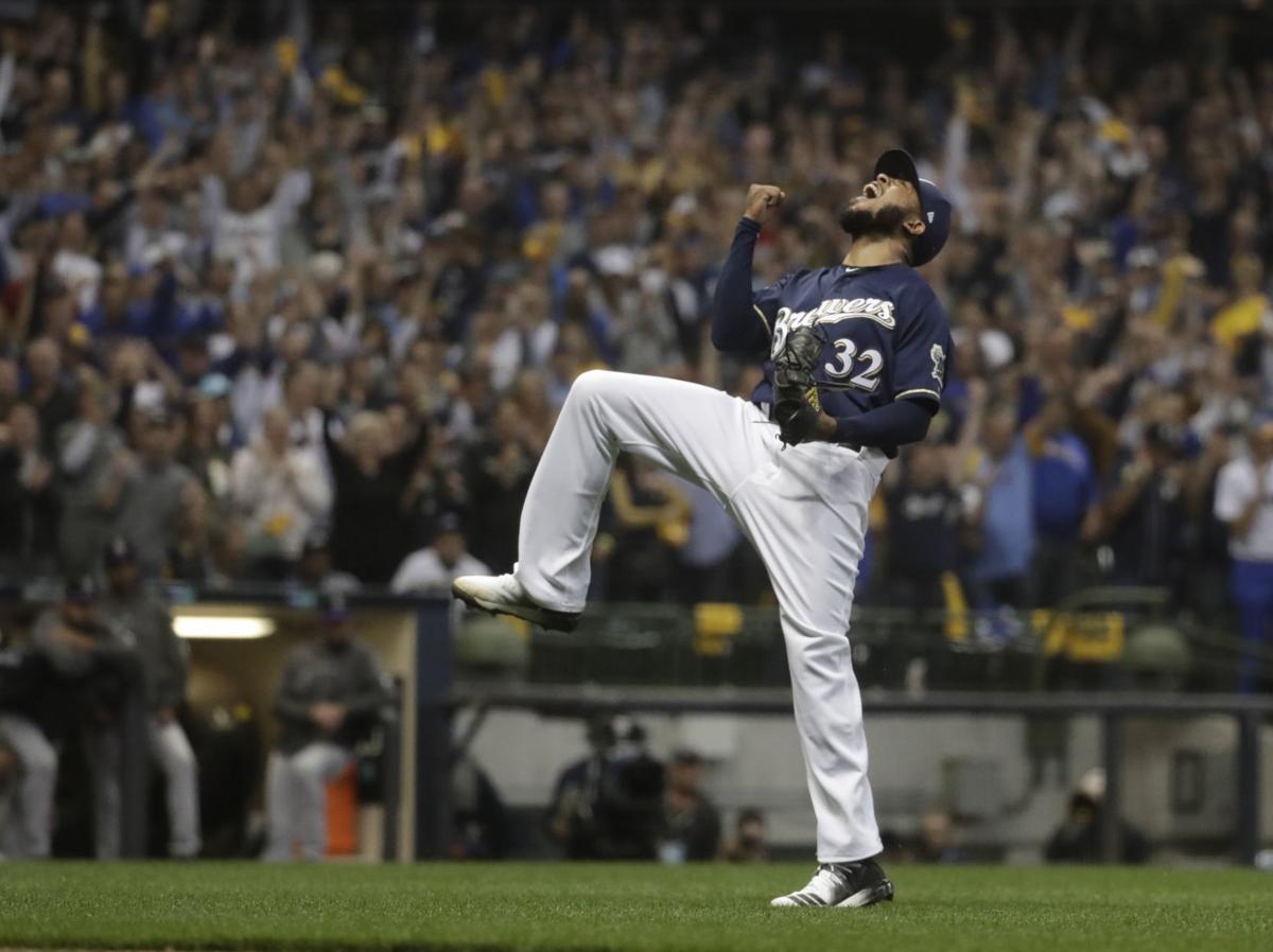 Jeremy Jeffress celebrates Game 2 NLDS, AP photo