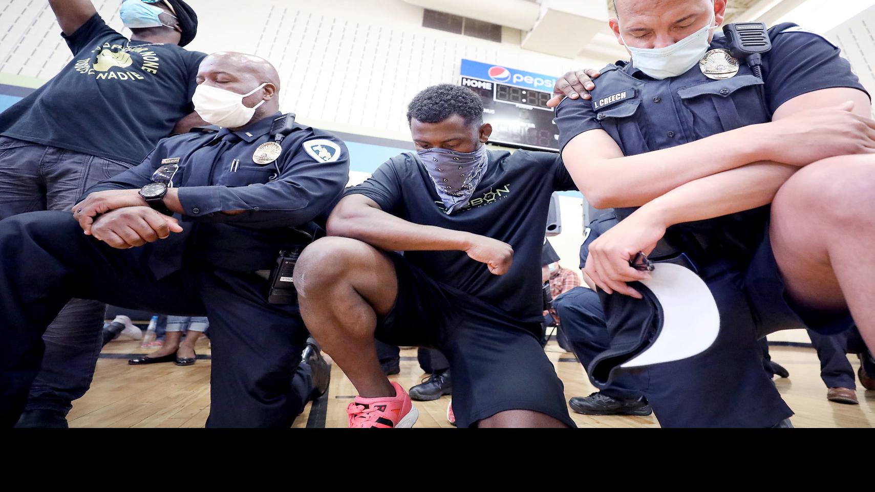 Madison Police Members Of Black Community Kneel Together After Days Of Protests Local News Madison Com