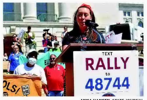 Rally-goers: Steer surplus to public schools