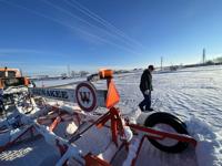 Grooming the snowmobile trail