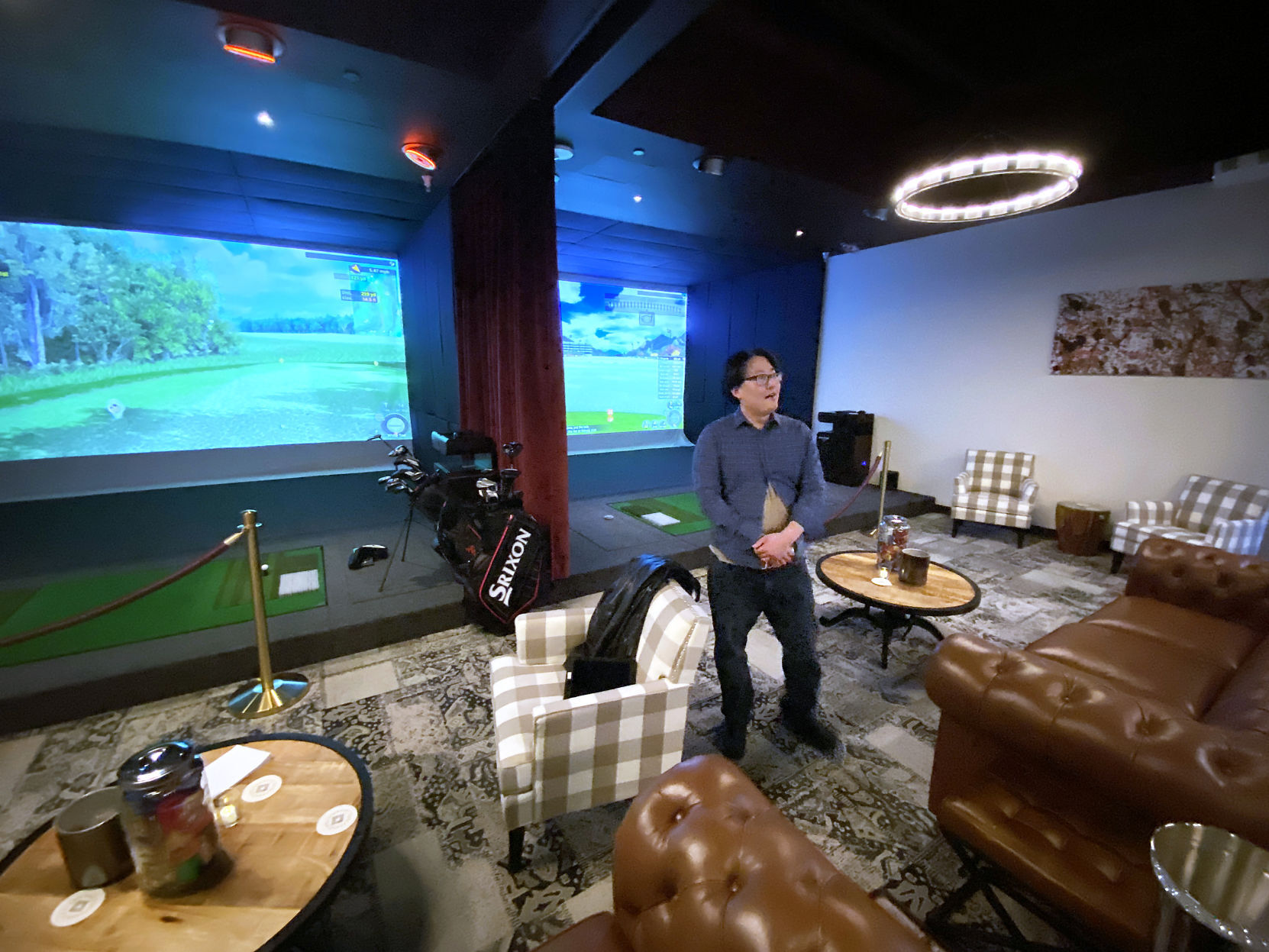 Expansive virtual golf lounge in downtown Madison only the