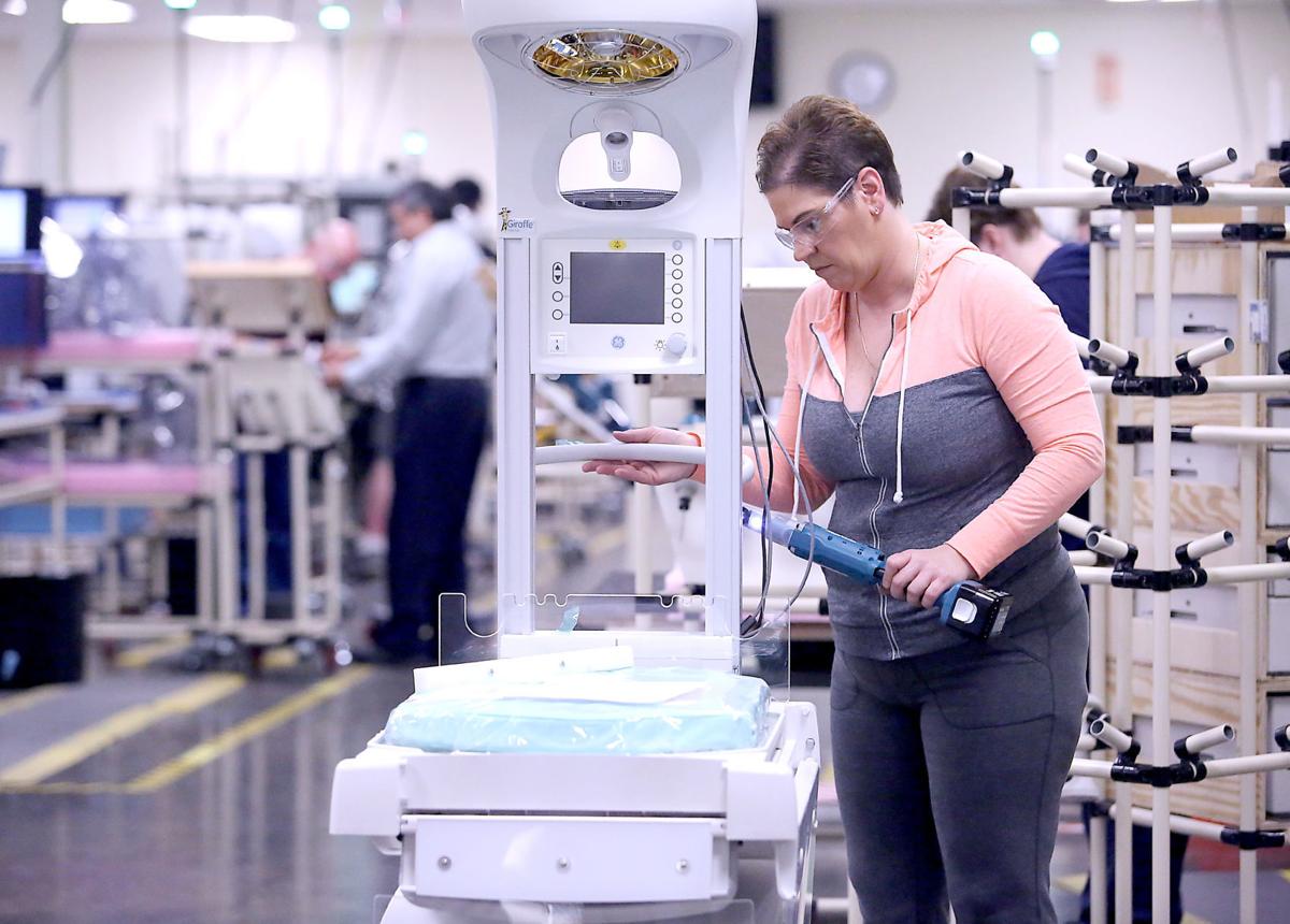 Incubators and baby warmers add to the product mix at GE Healthcare's  Madison plant