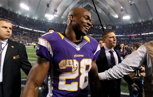 First round comes and goes  Adrian Peterson still a Minnesota Viking