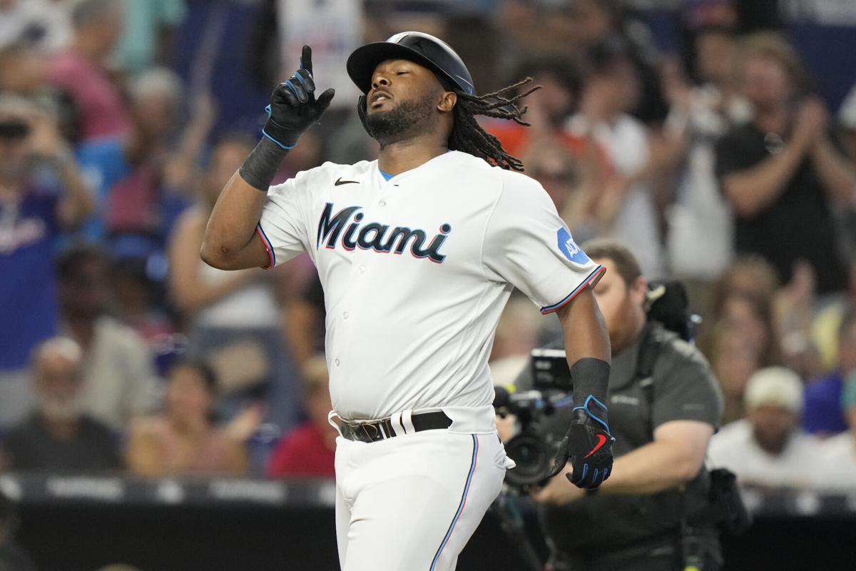 Marlins hold on for tight win over Brewers