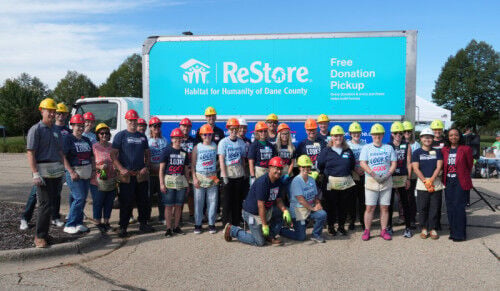 A parking lot full of possibility: American Family Insurance builds with Habitat Dane