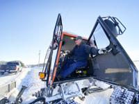 Grooming the snowmobile trail