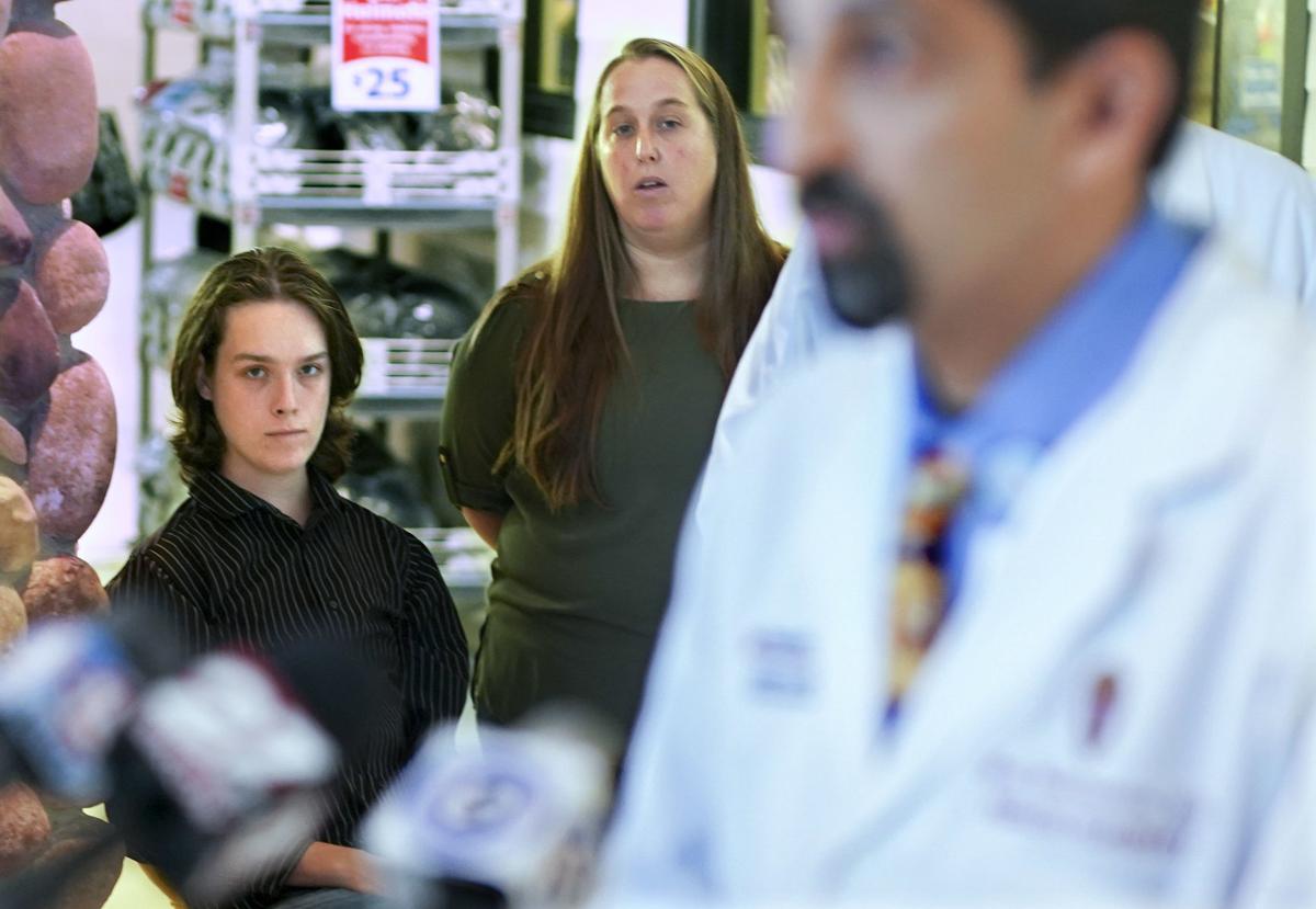 Logan, Rebeccca and Dr. Vivek Balasubramaniam