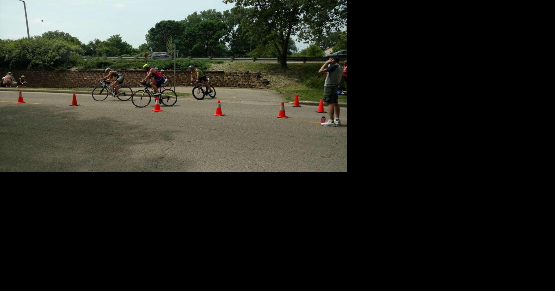 Thousands compete in Madison Ironman triathlon in sweltering heat