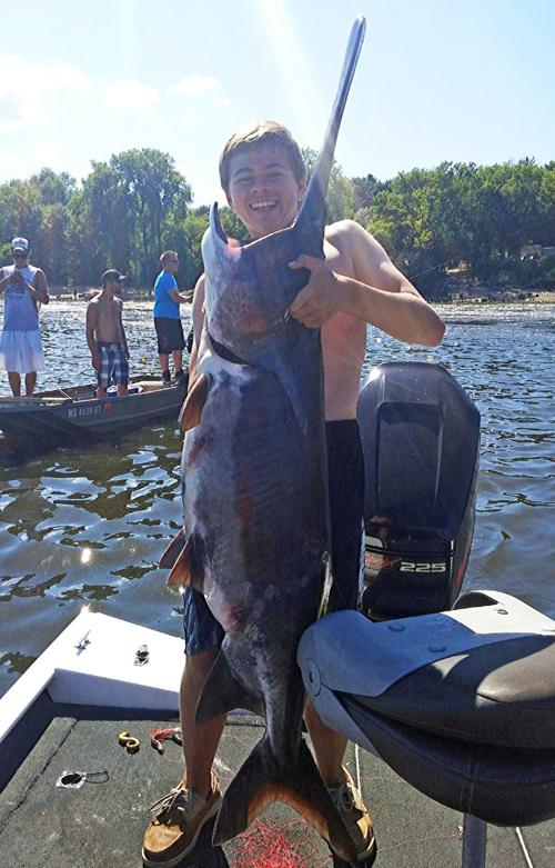 Patrick Durkin Middleton Boys Haul In Quickly Release Huge Paddlefish On Wisconsin River Columnist Madison Com