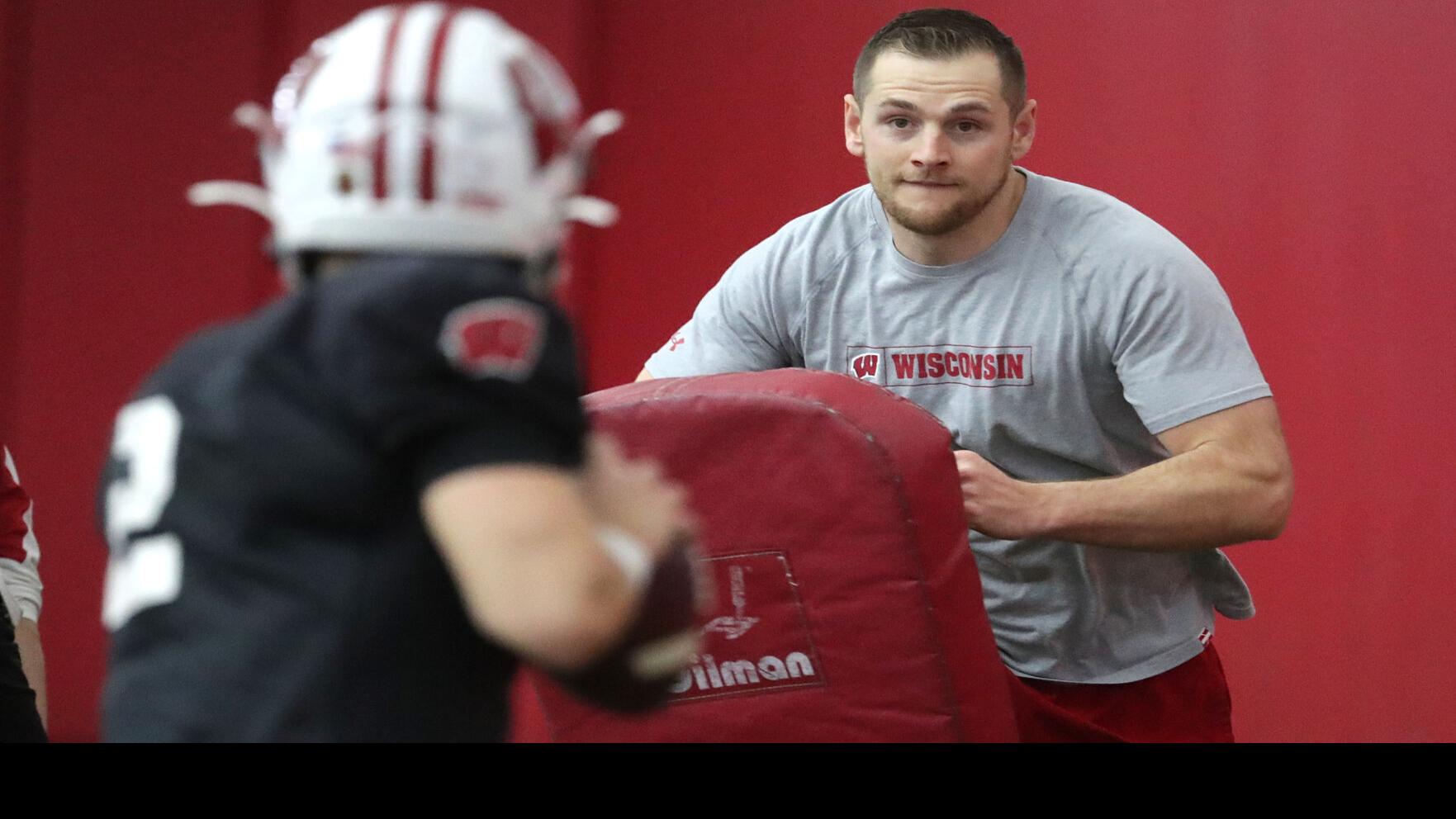 Meet the Wisconsin football graduate assistant who's been a 'blessing' for the program's QBs