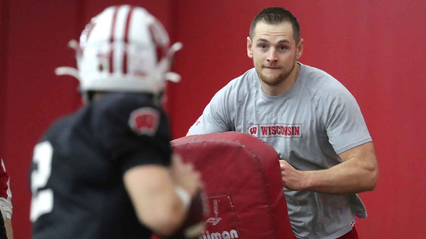 Meet the Wisconsin football graduate assistant who's been a 'blessing' for the program's QBs