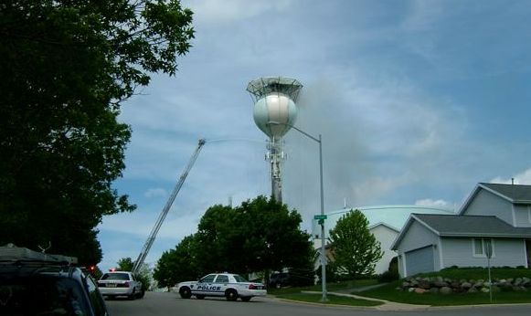 Official: Welders sparked fire in water tower that prompted evacuation