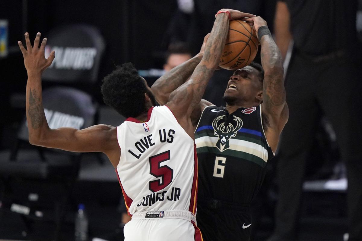 Slipping away: Bucks' last-minute comeback bid falls short as Heat