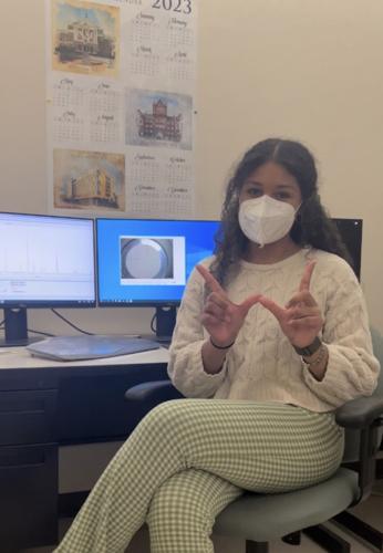 Ahmia Williams-Walsh in the lab doing data analysis of the XRD machine spectra X-ray refraction machine.jpg