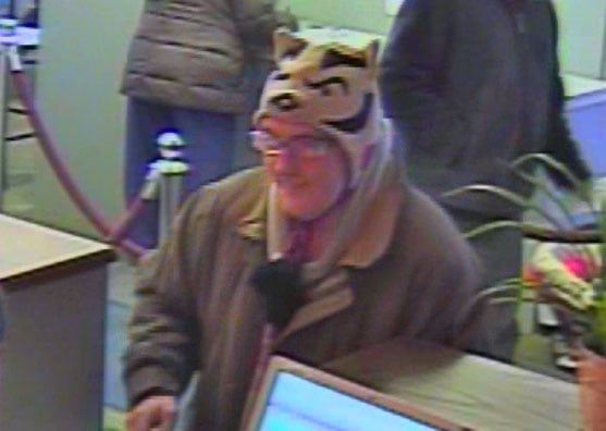 Robber wearing Bucky Badger hat