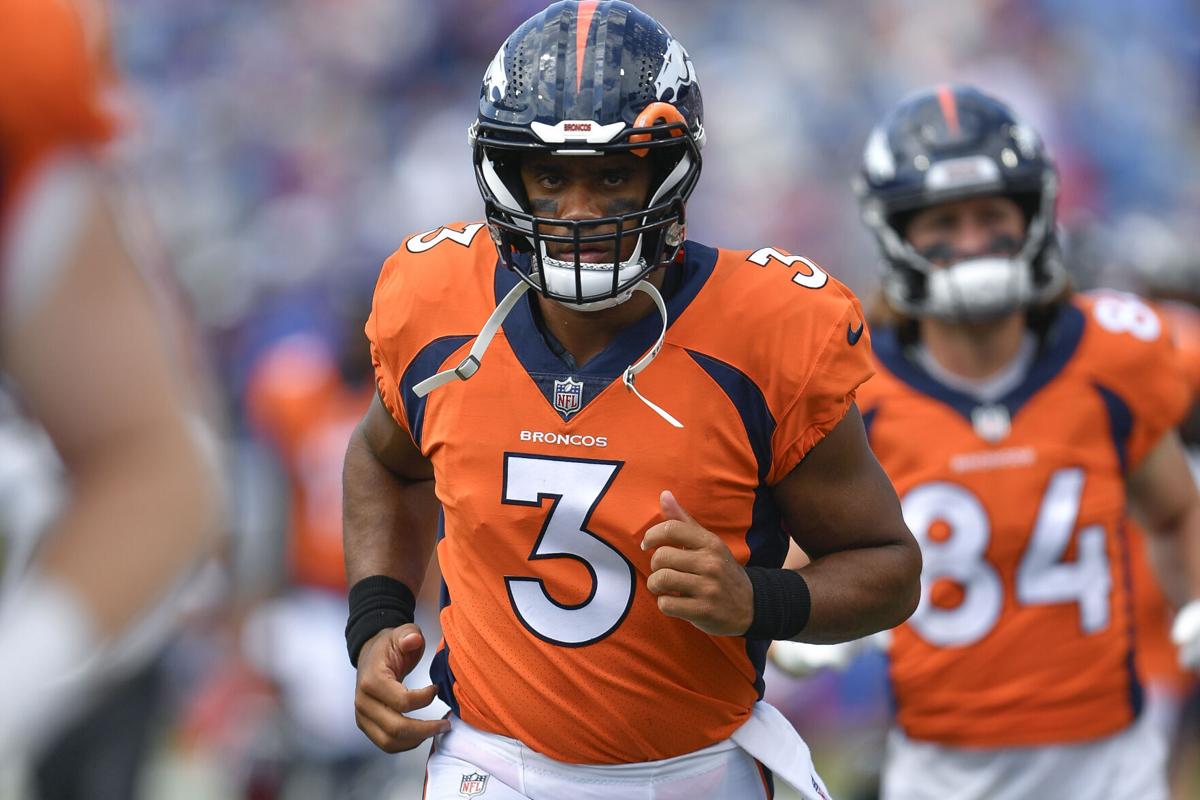 Former Badgers QB Russell Wilson signs huge extension with Broncos — but  left money on the table