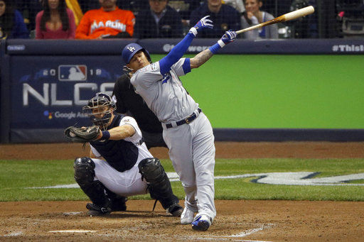 Manny Machado whiffs, AP file photo