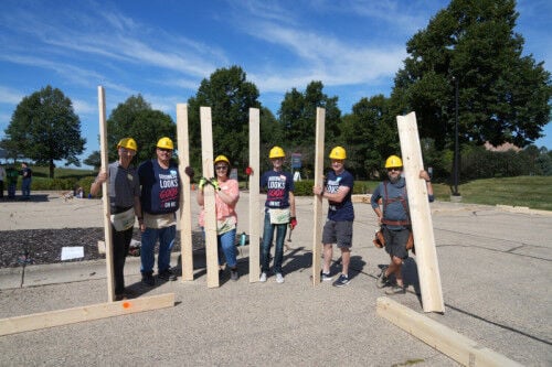 A parking lot full of possibility: American Family Insurance builds with Habitat Dane