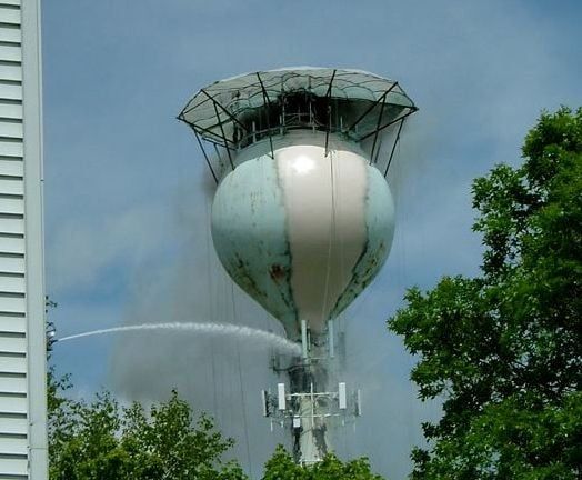 Official: Welders sparked fire in water tower that prompted evacuation