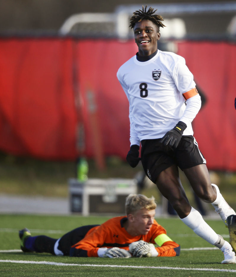 WIAA state boys soccer photo: Madison Conduah all smiles after a goal