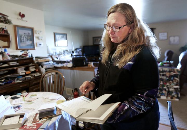 Brenda with Leon's journal