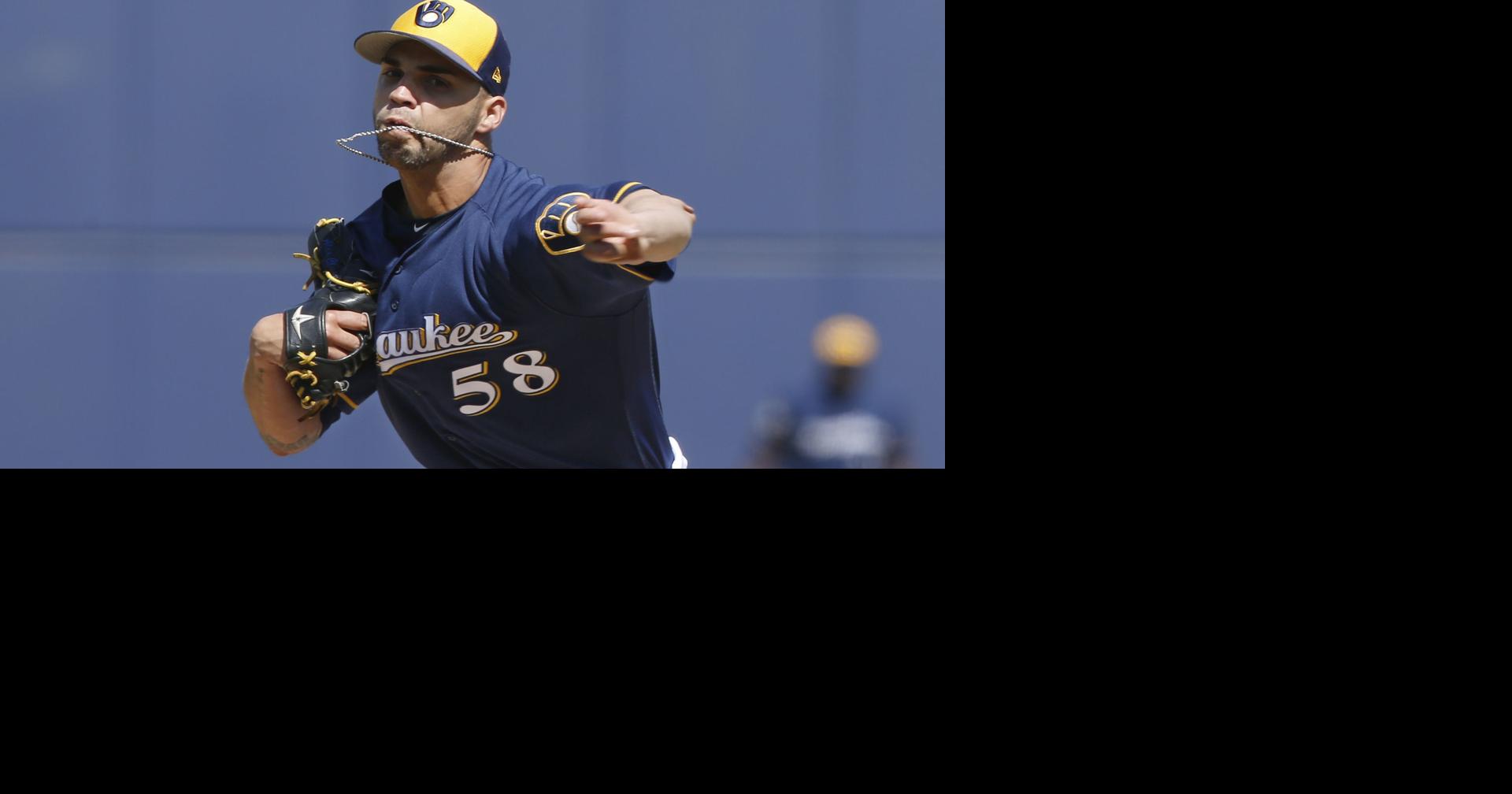 Manager Craig Counsell talks about pitcher Alex Claudio leading
