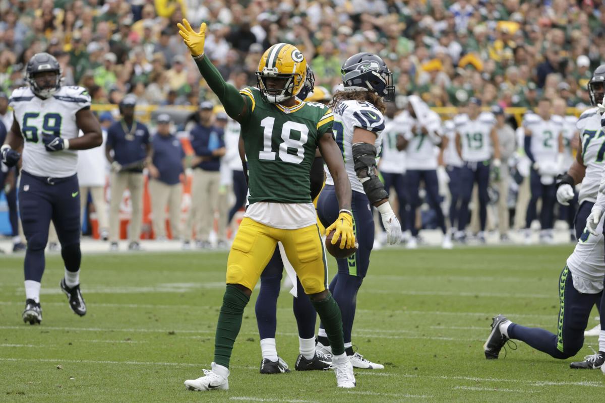 Green Bay Packers wide receiver Malik Heath (18) runs during the first half  of a preseason NFL football game against the New England Patriots Saturday,  Aug. 19, 2023, in Green Bay, Wis. (