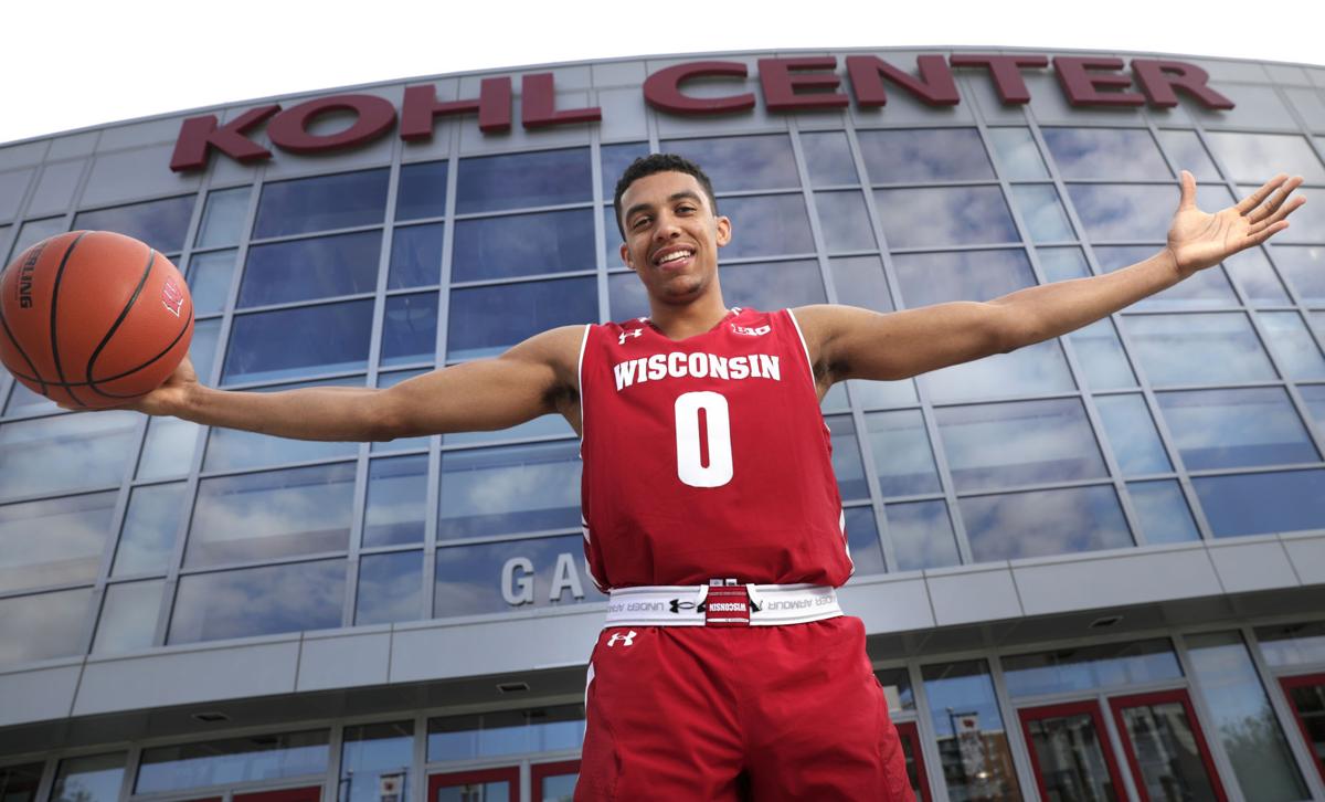 Badgers Men S Basketball Sophomore Guard D Mitrik Trice Embraces