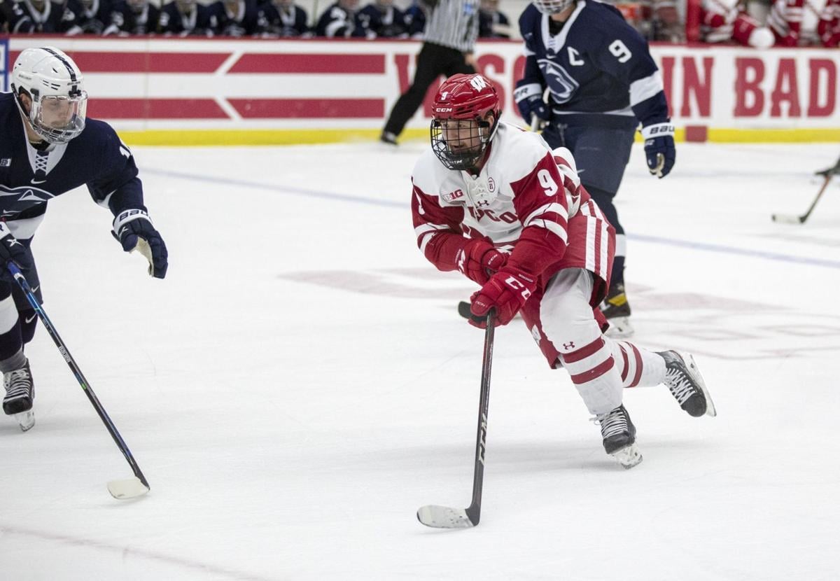 Cole Caufield, Wisconsin Badgers men's hockey team break ...