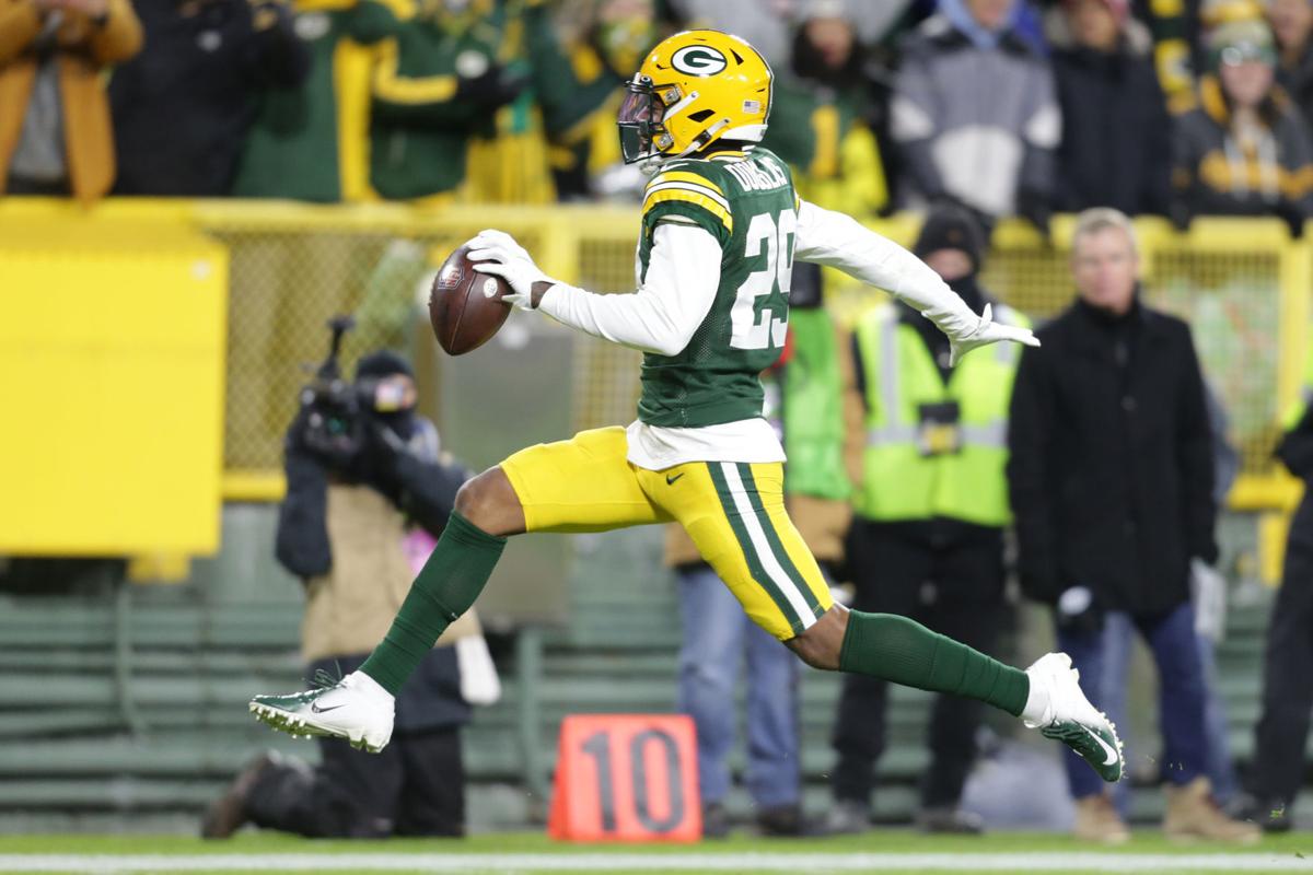 AJ Dillon helps Packers power past Rams, 36-28, as Aaron Jones returns