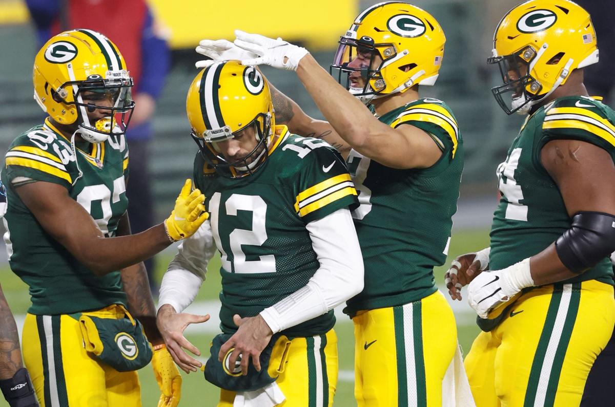 Aaron Rodgers, Packers roll over Rams to reach NFC title game - Chicago  Sun-Times