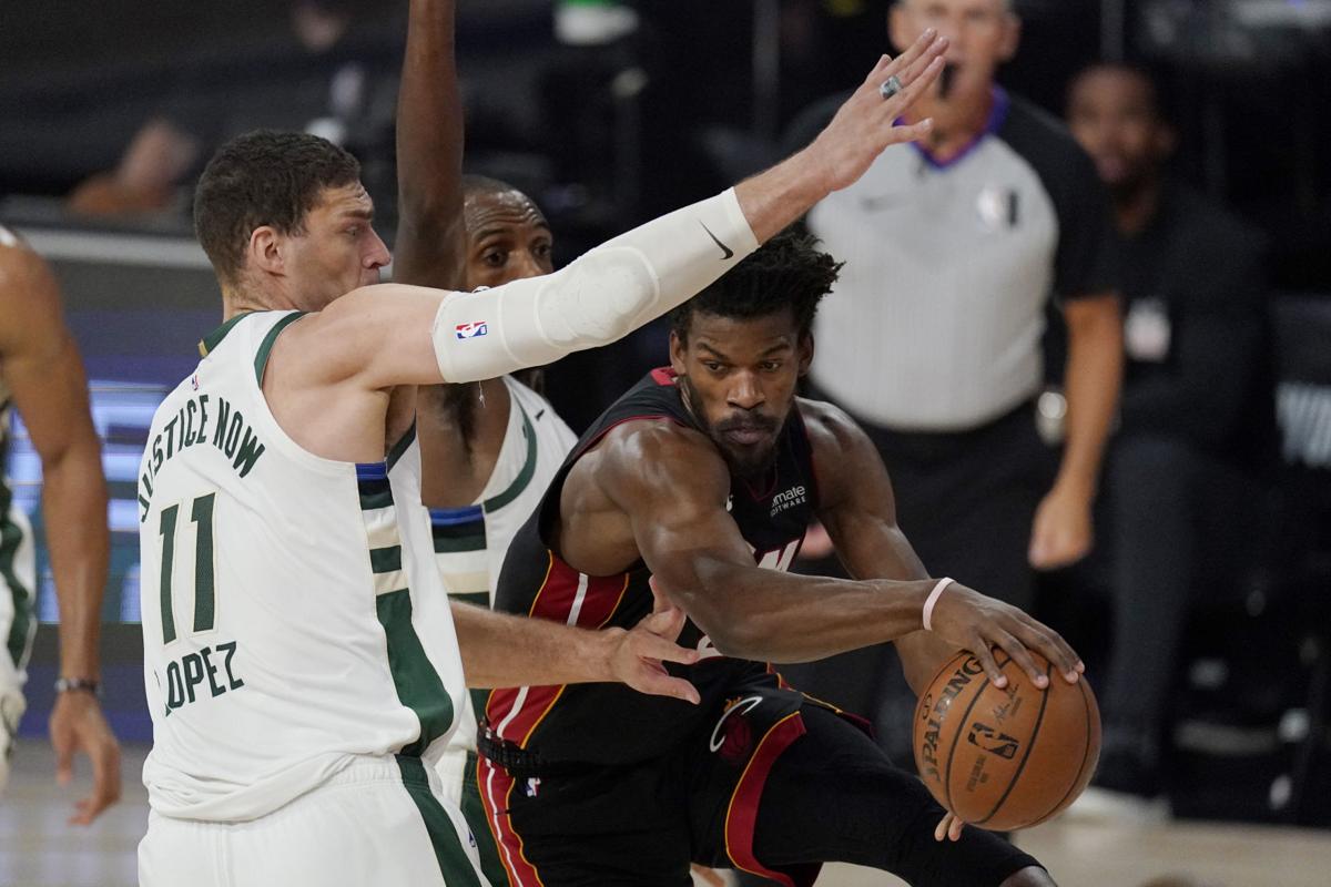On the ropes: Bucks on brink of elimination after Heat storm from behind  with red-hot fourth quarter