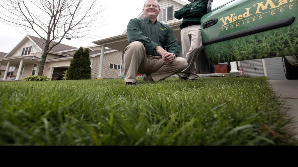 In the Family Business Dad, son own Weed Man Lawn Care