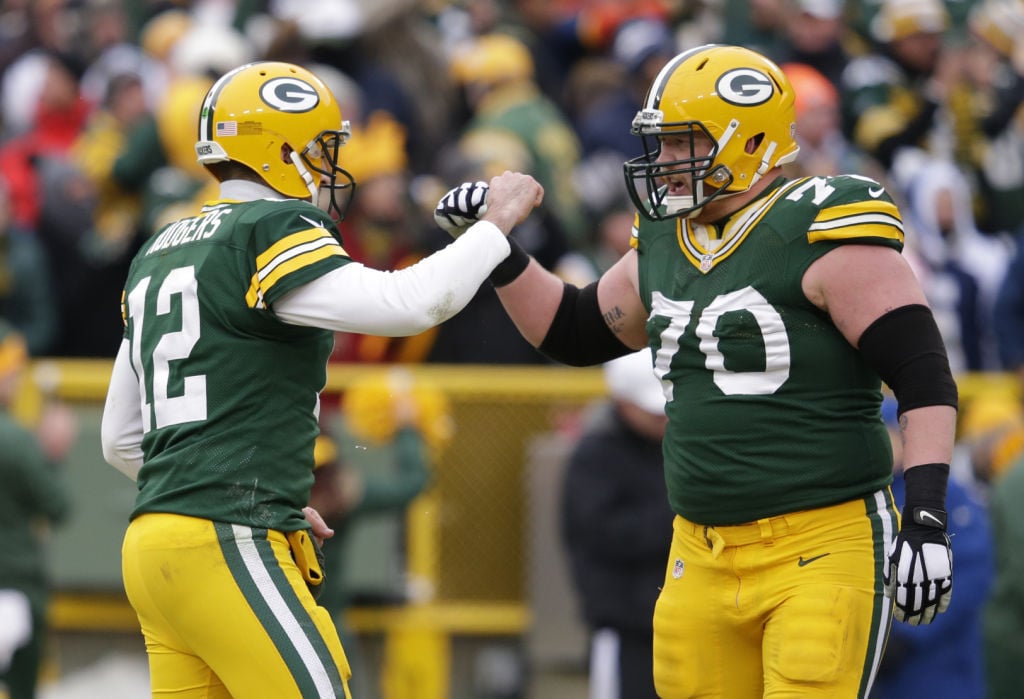 Image result for tj lang aaron rodgers