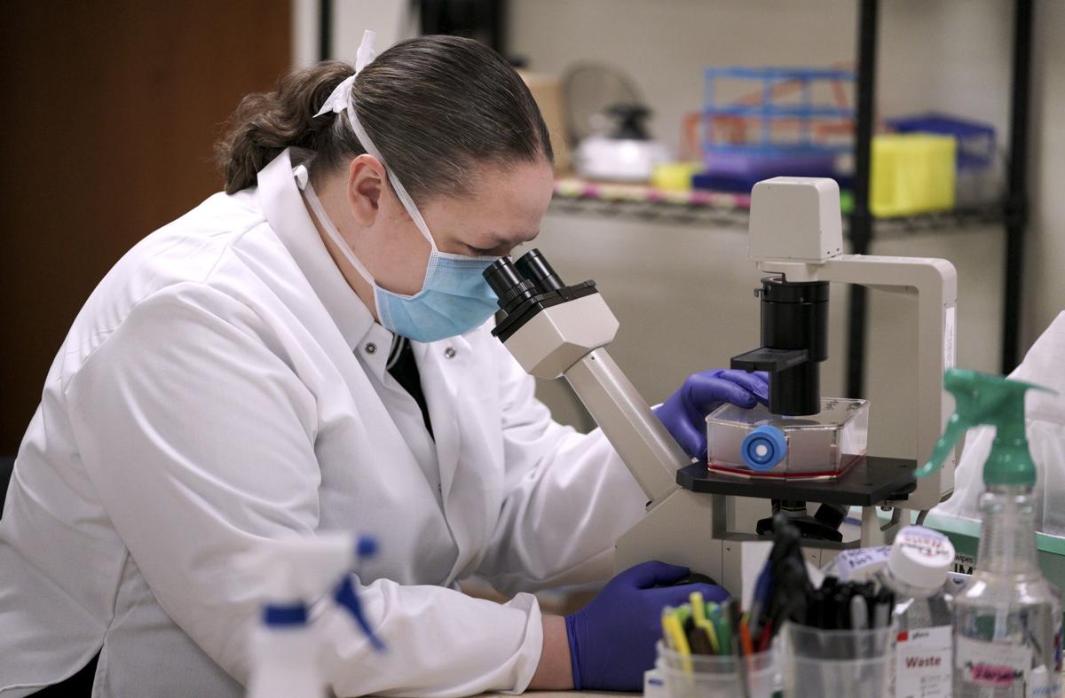 Lindsay with microscope