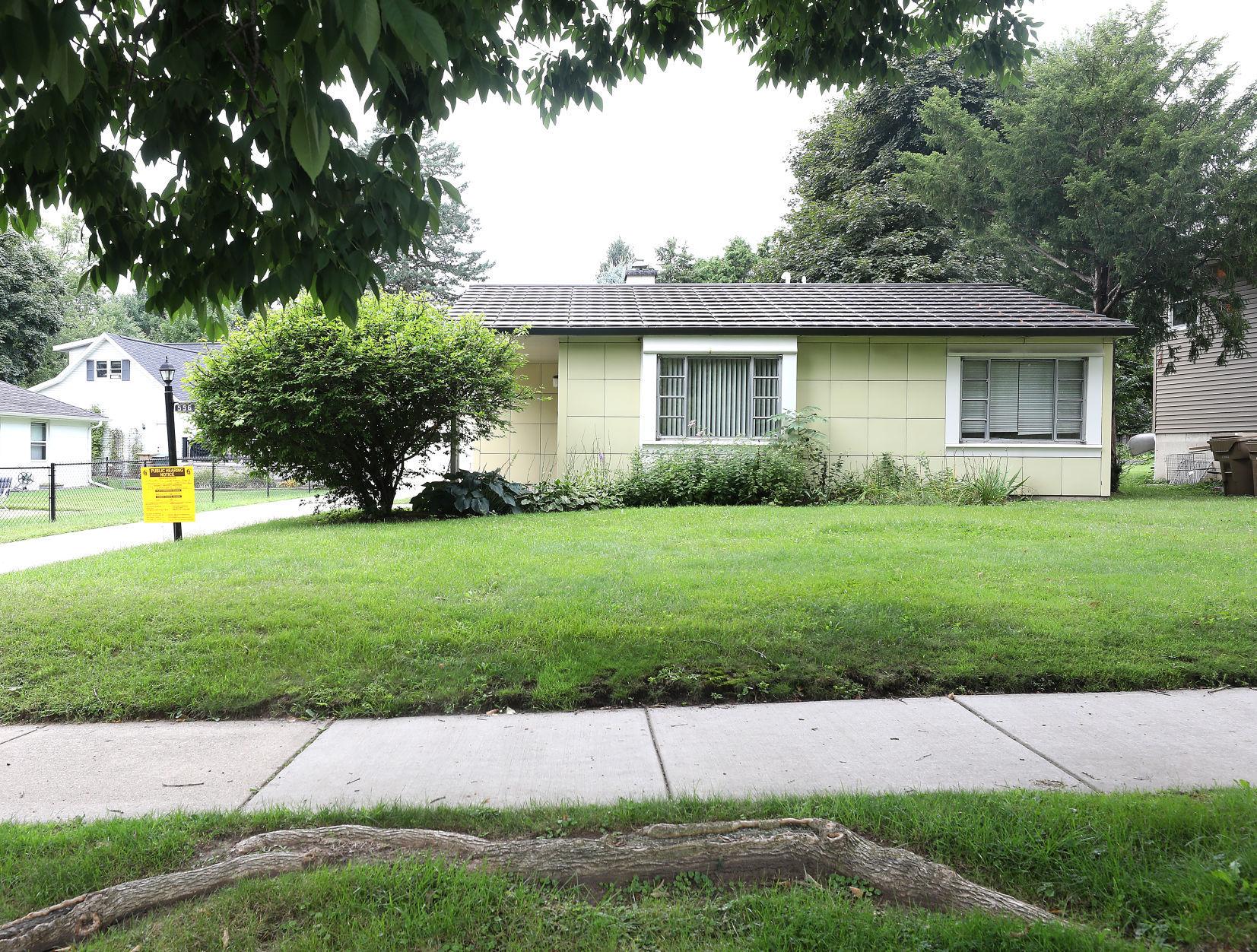 small "maize yellow" steel house