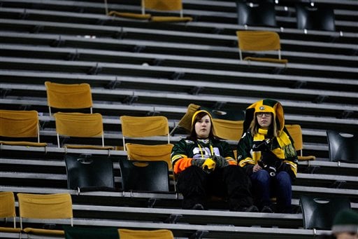 New York Giants fan Kevin Bock shows off his blue cheese hat before an NFL  divisional playoff football between the Green Bay Packers and the New York  Giants Sunday, Jan. 15, 2012