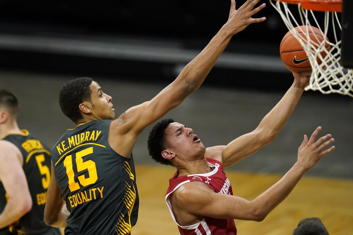 Iowa 77, UW 73