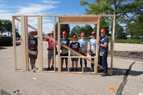 A parking lot full of possibility: American Family Insurance builds with Habitat Dane