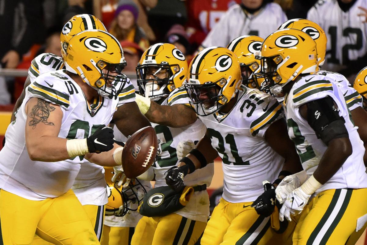 Packers celebrate Tyler Lancaster fumble recovery, AP photo