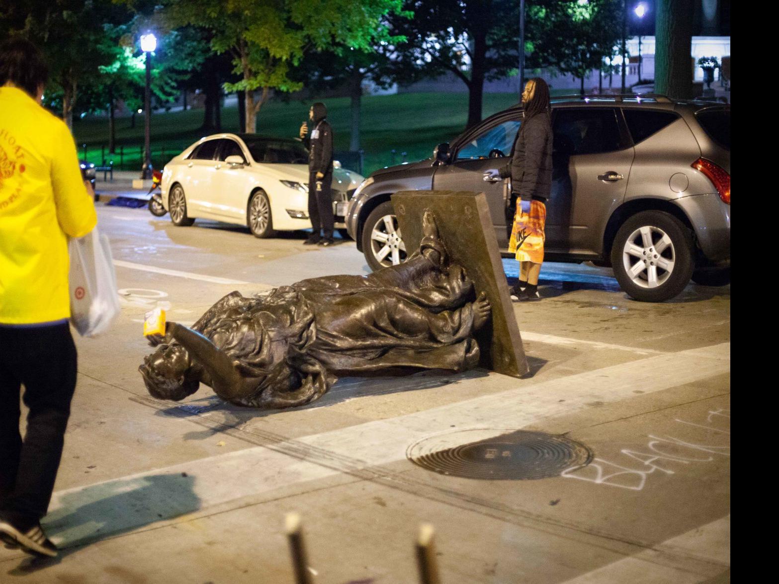 Protesters Tear Down Statues Punch Senator Set Small Fire In