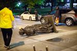 Protesters tear down statues, punch senator, set small fire in Madison after arrest of Black activist