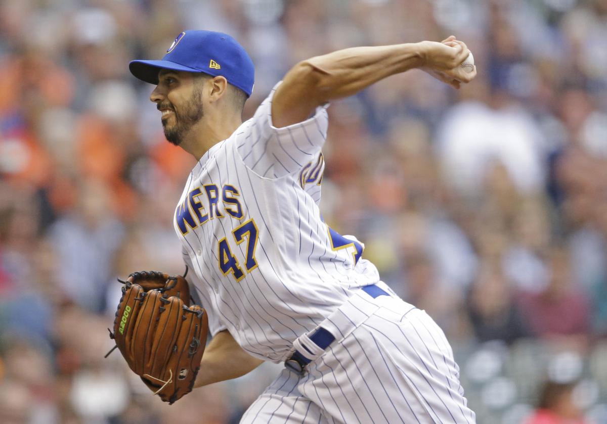 brewers starting pitchers don t mind giving way to stellar bullpen