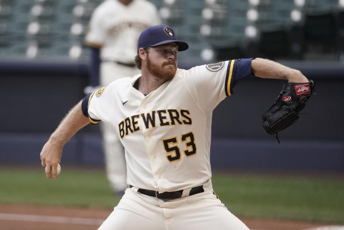 Brewers reach 1-year deals with Josh Hader, Brandon Woodruff