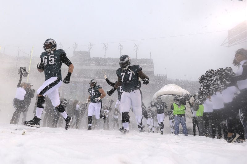 Photos: Snow, snow and more snow for Lions-Eagles game