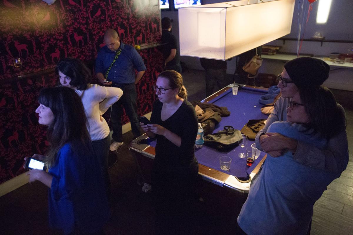 At Madison\'s Plan B nightclub, Hillary Clinton supporters slide from ... At Madison\'s Plan B nightclub, Hillary Clinton supporters slide from ...
