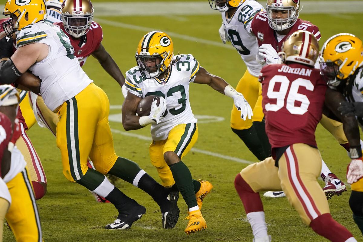 Down 2 running backs because of COVID-19, Packers welcome Aaron Jones back  with a bang | Pro football | madison.com