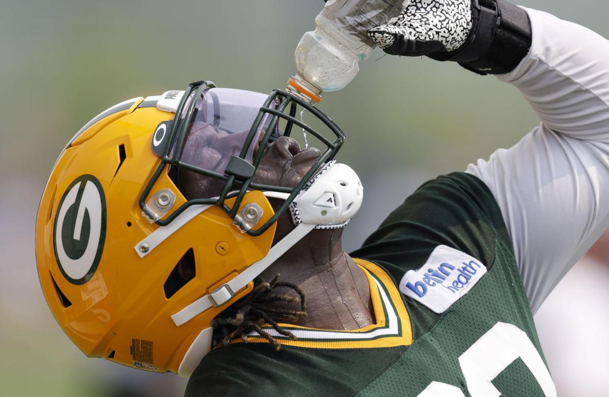 Big defensive lineman T.J. Slaton making big impression at Packers camp